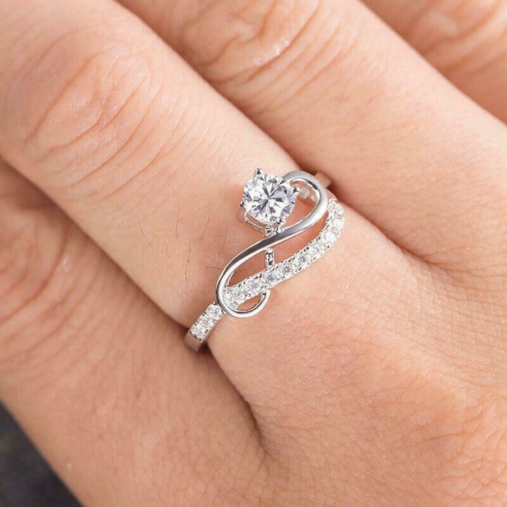 White Gold Infinity Swirl Wave Moissanite Ring