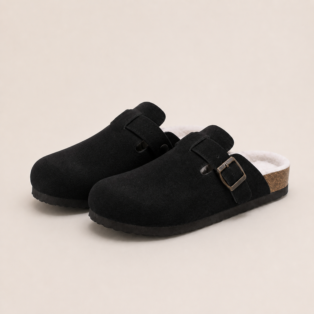 Lya Suede Clogs in Black - three-quarter view